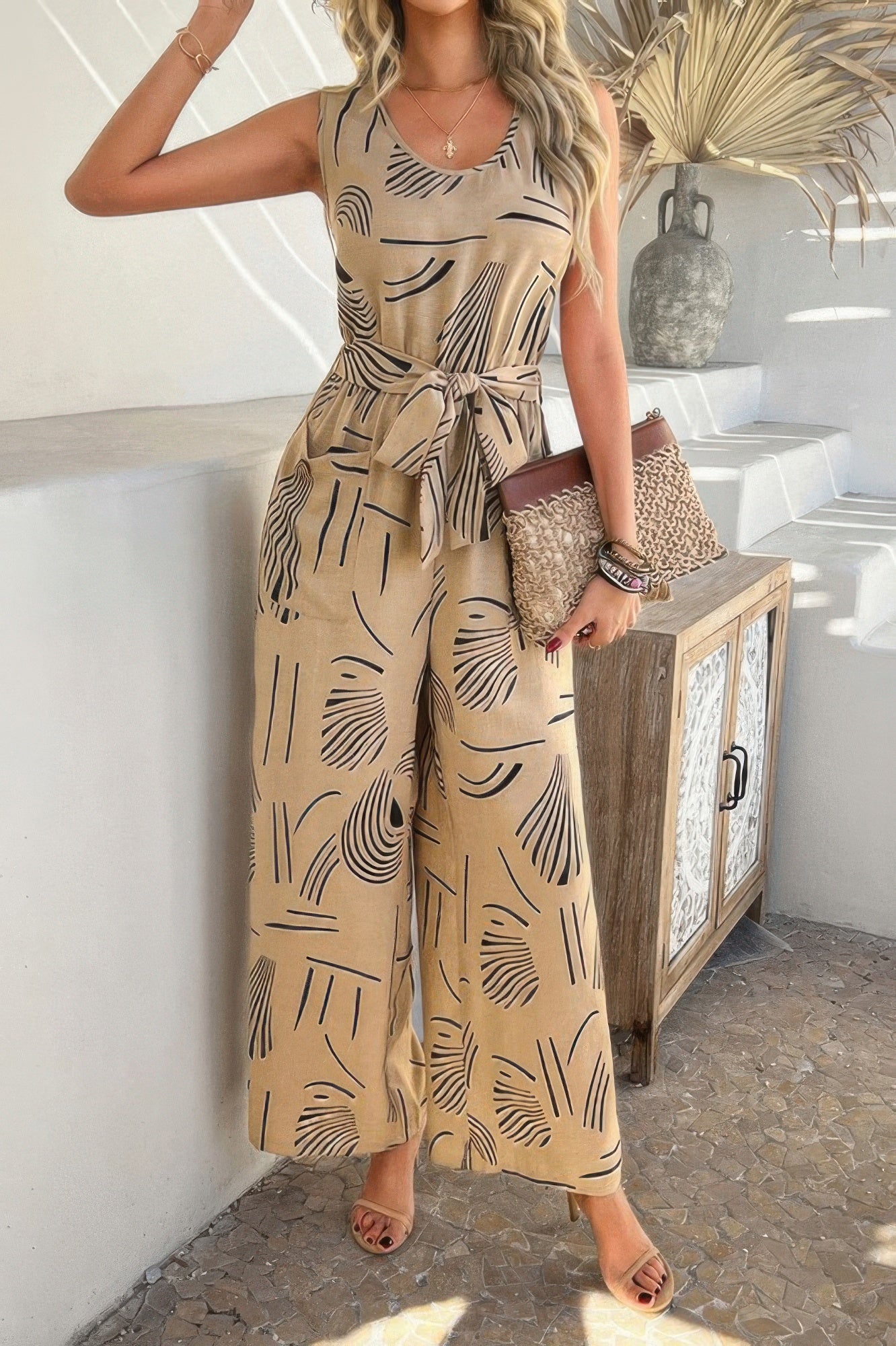 Allover Print Sleeveless Wide Leg Tie Waist Jumpsuit | by atgodanddesigns